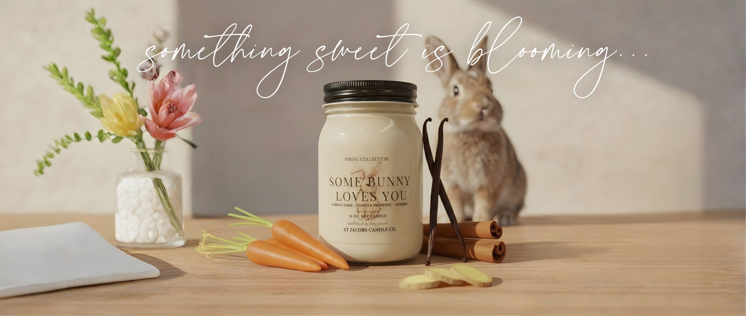 Spring candle launch banner featuring a hand-poured soy candle with spring florals and Easter-inspired styling by St. Jacobs Candle Co.